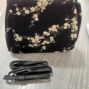 “Midnight Blossom “ Cache Black and Gold Floral Crossbody Bag